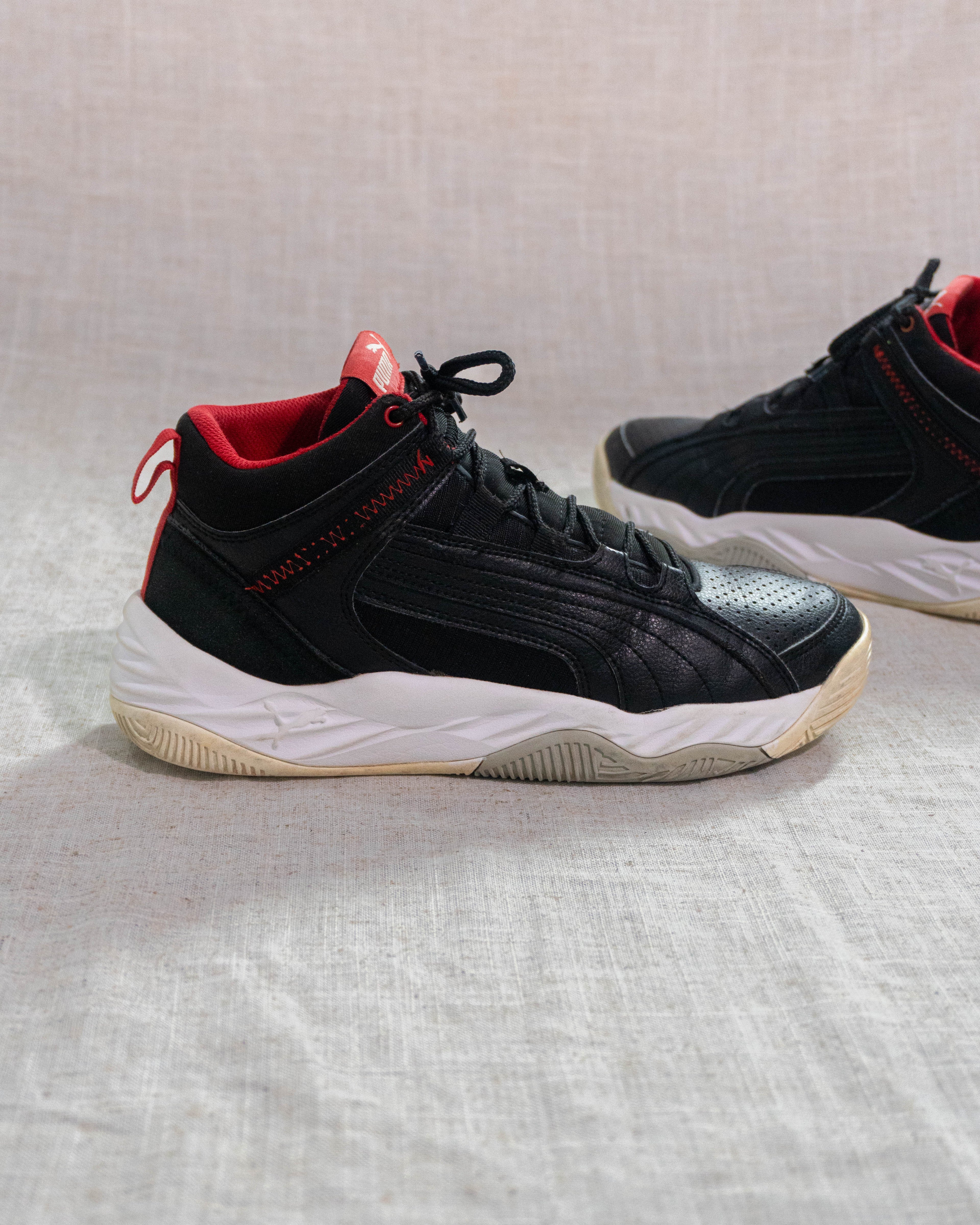 Puma Rebound Future Evo black red sneakers Pakistan original