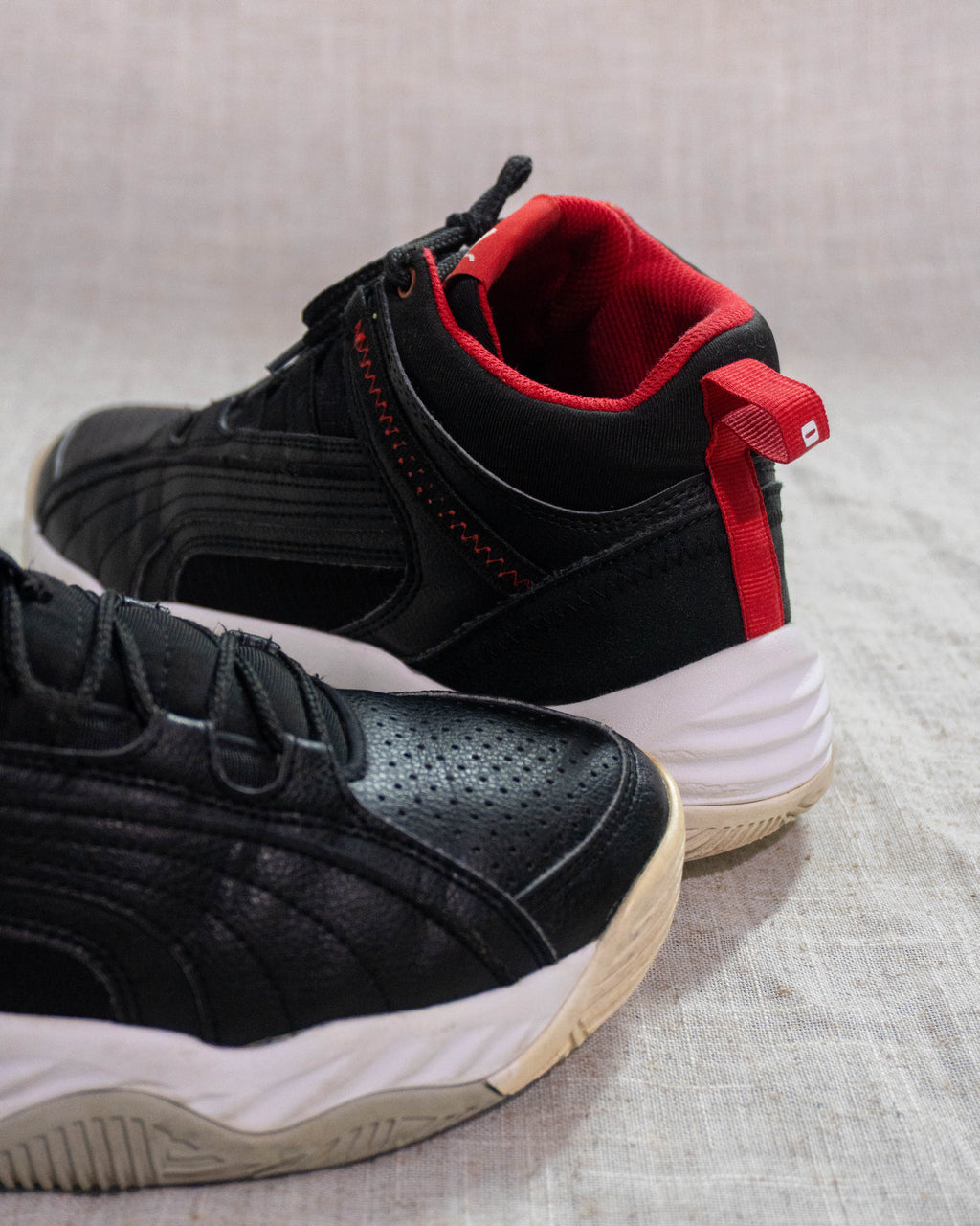Puma Rebound Future Evo black red sneakers Pakistan original